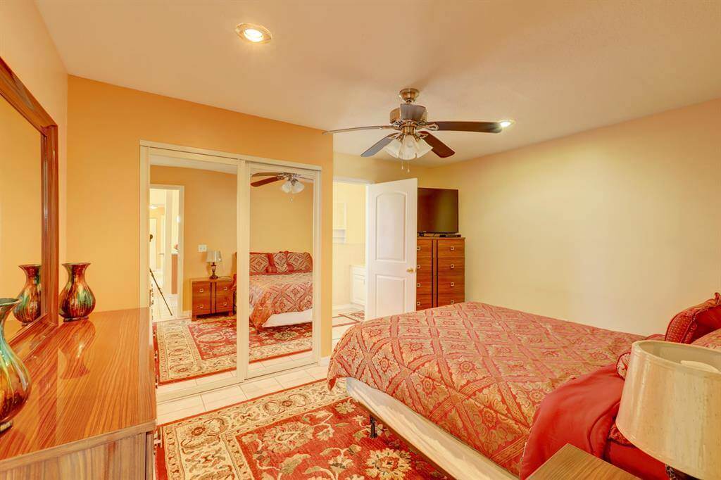 A bedroom at Cayuga Sober Living House in Port St Lucie Florida