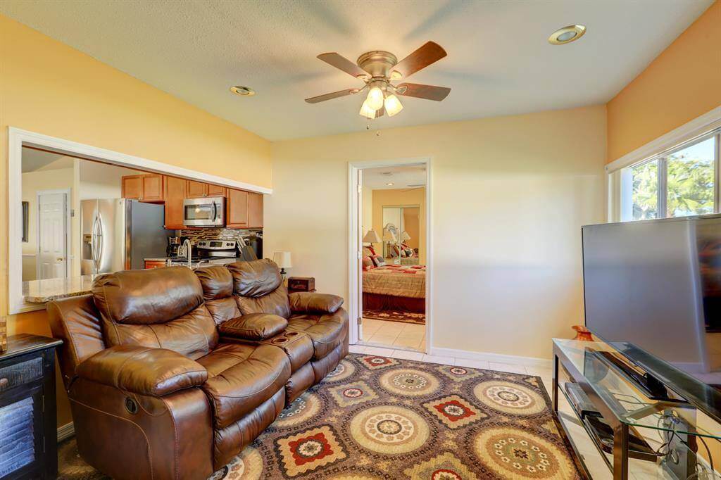 The TV room at Cayuga Sober Living House in Port St. Lucie Florida