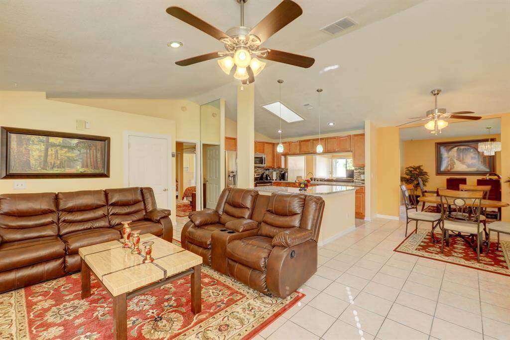 An interior view of the open floor plan at Cayuga Sober Living House in Port St. Lucie Florida